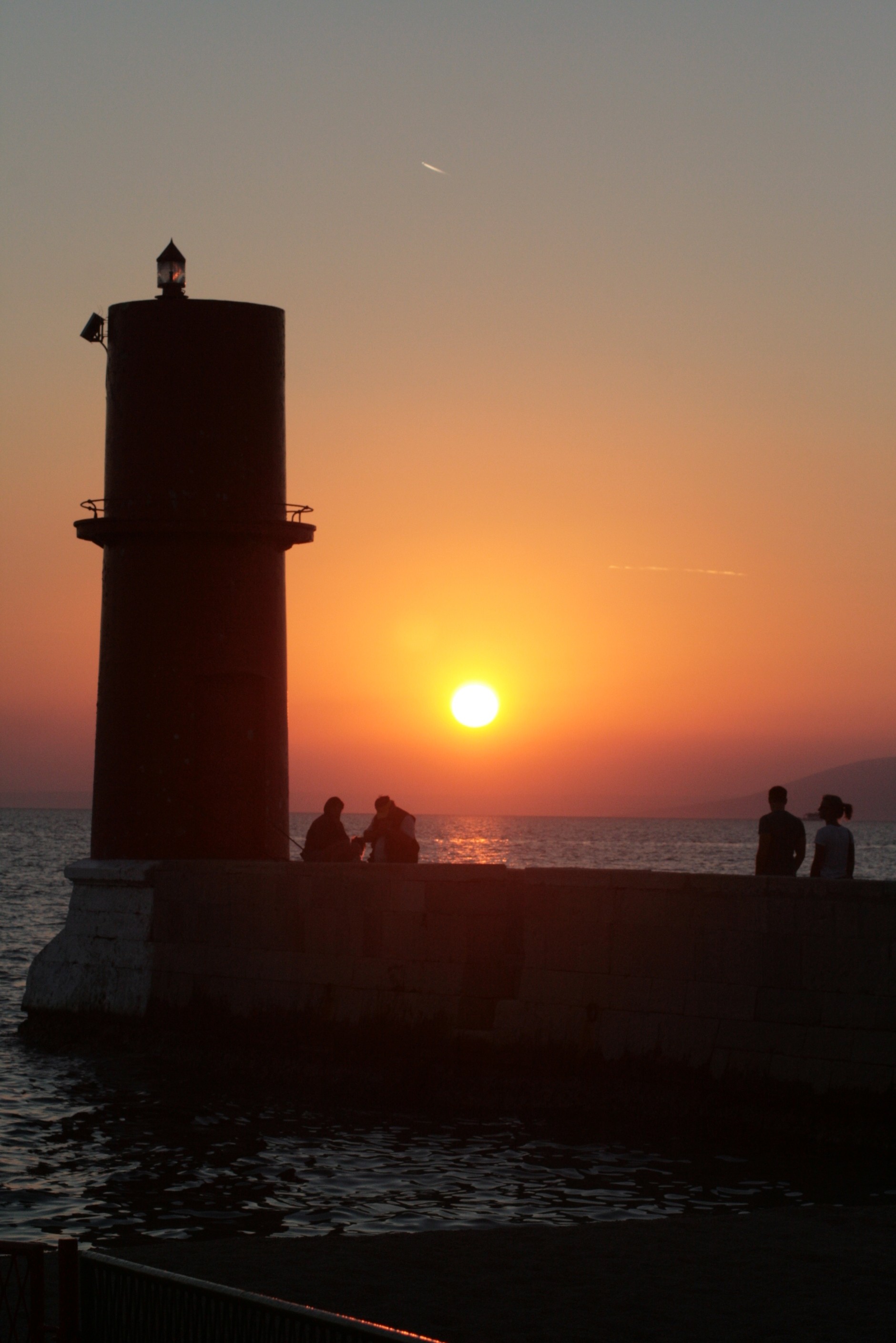 Abendstimmung am roten Leuchtturm, Kovacine, 2013 © Heinz Ramacher Sonnenuntergang am roten Leuchtturm