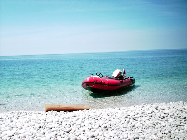 Mit dem Boot zum Cap Pernat, 2013 © Heinz Ramacher Am Cap Pernat
